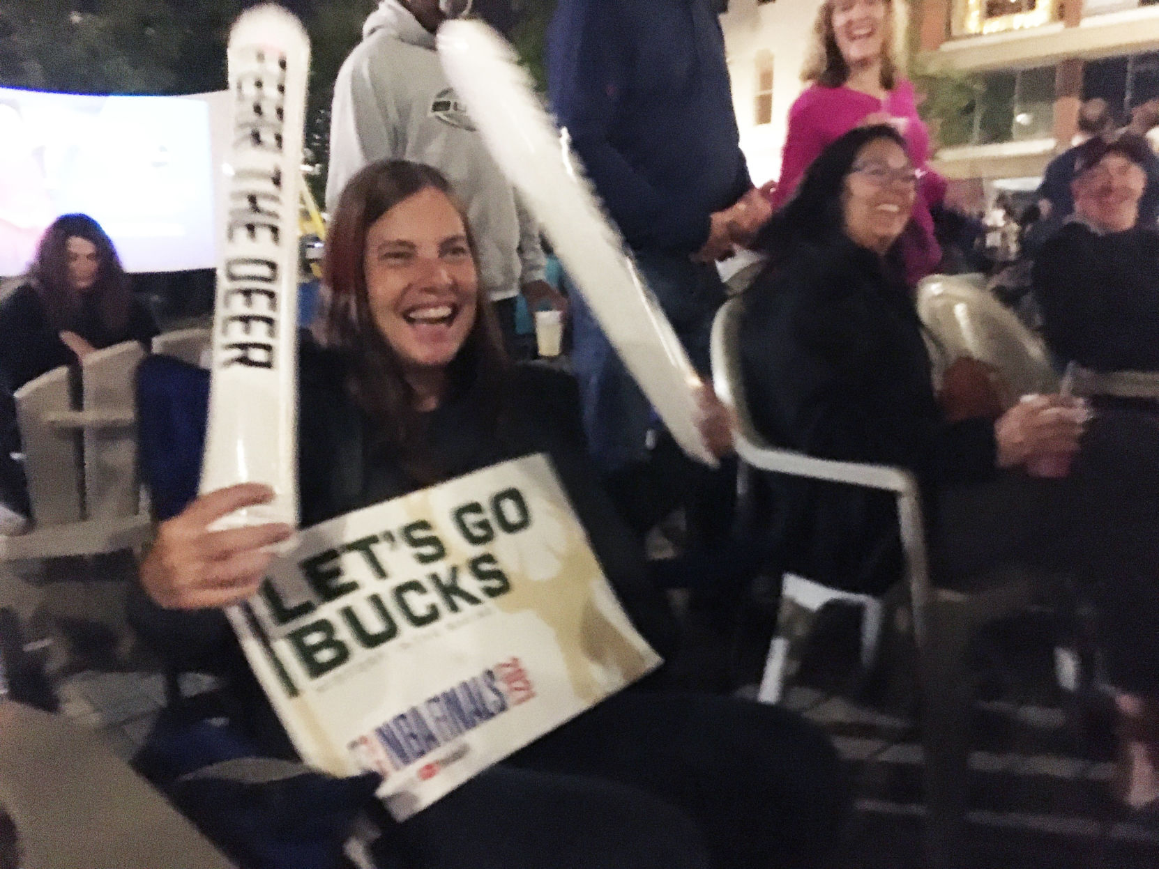 Marianne Burks of Mount Pleasant works the noise makers at Bucks watch party